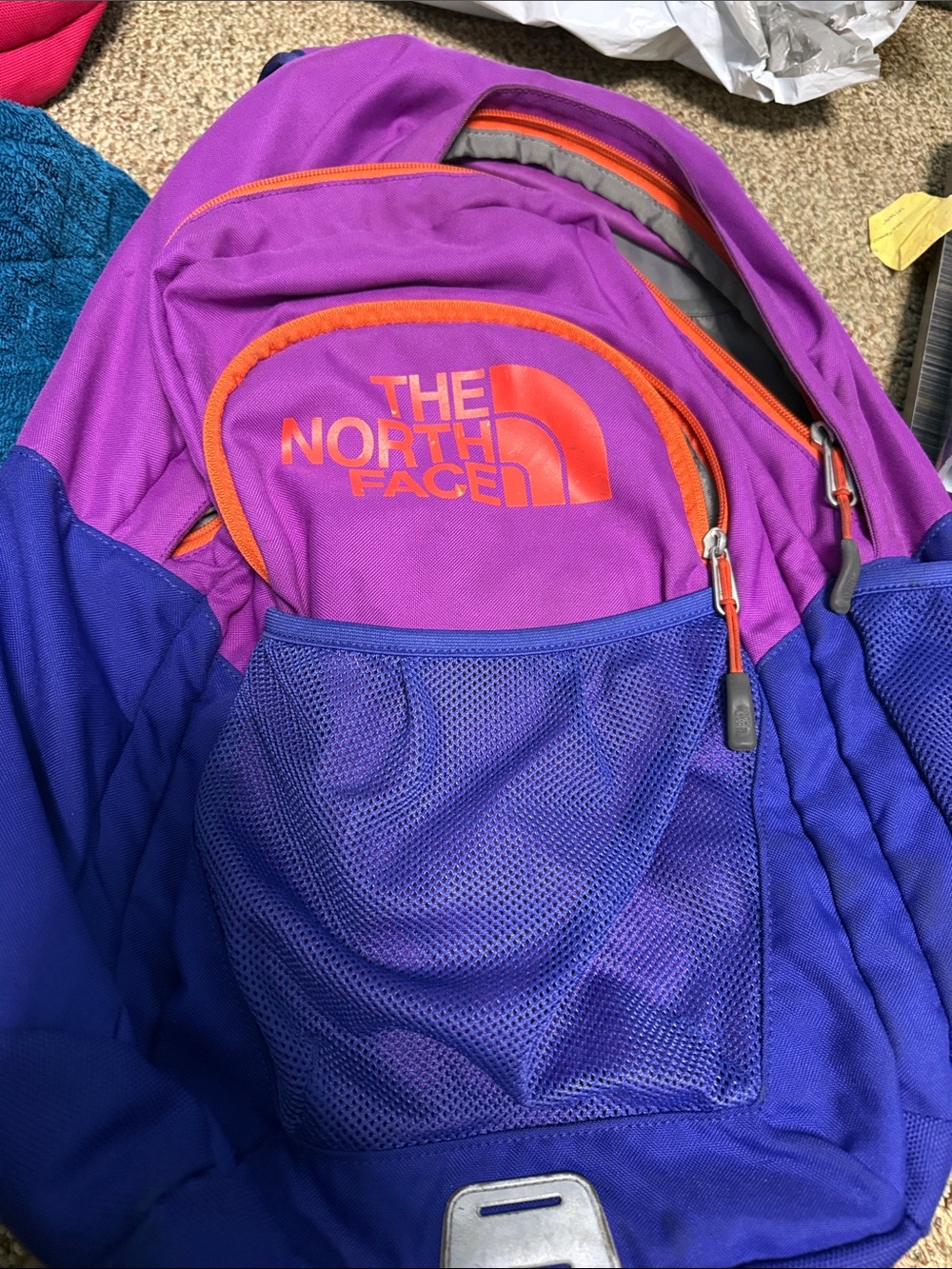 The North Face Purple & Blue Kids' Backpack with Orange Accents